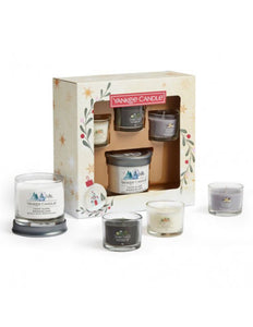 1 CANDELA PICCOLA E TRE CANDELE VOTIVA IN VETRO - Yankee Candle - Confezione Regalo  Snow Globe Wonderland